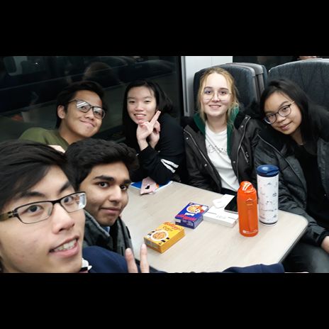 students from a sixth form college in Cardiff travelling to a debate