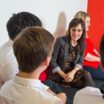 teacher talking to students