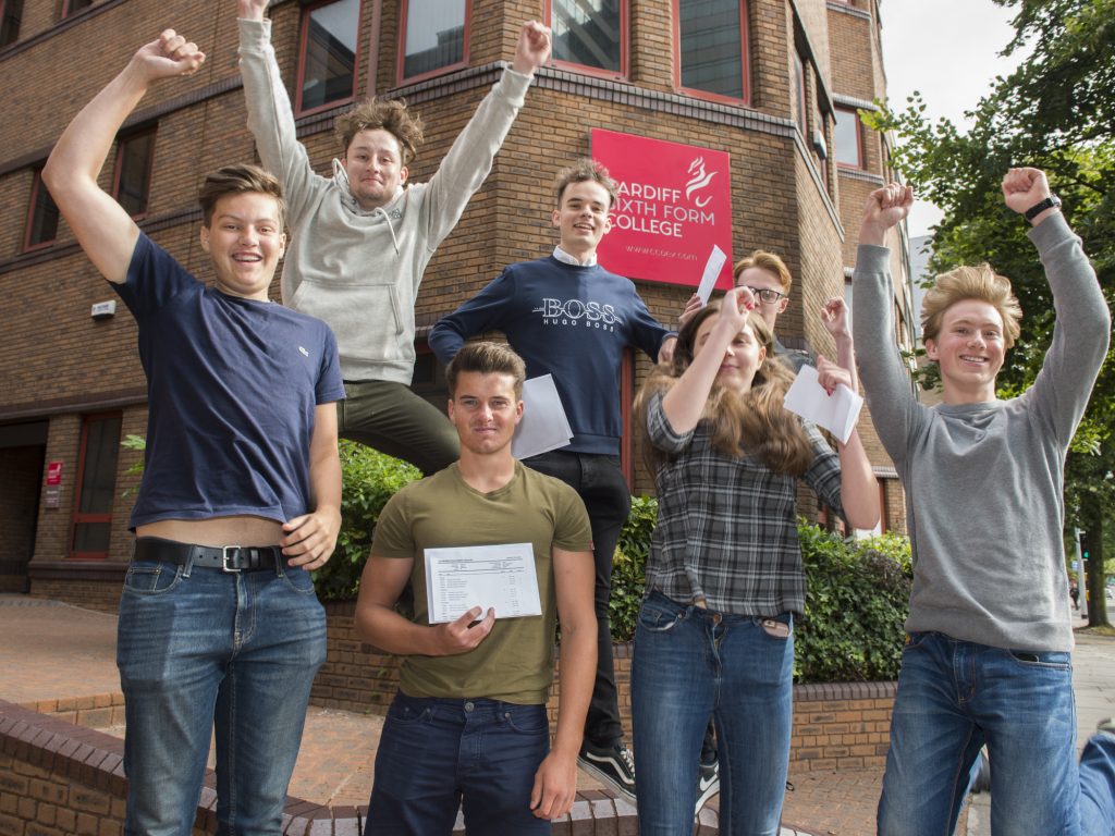 students from a top sixth form college celebrating exam success