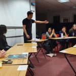 debate club taking place at a sixth form college in Cardiff