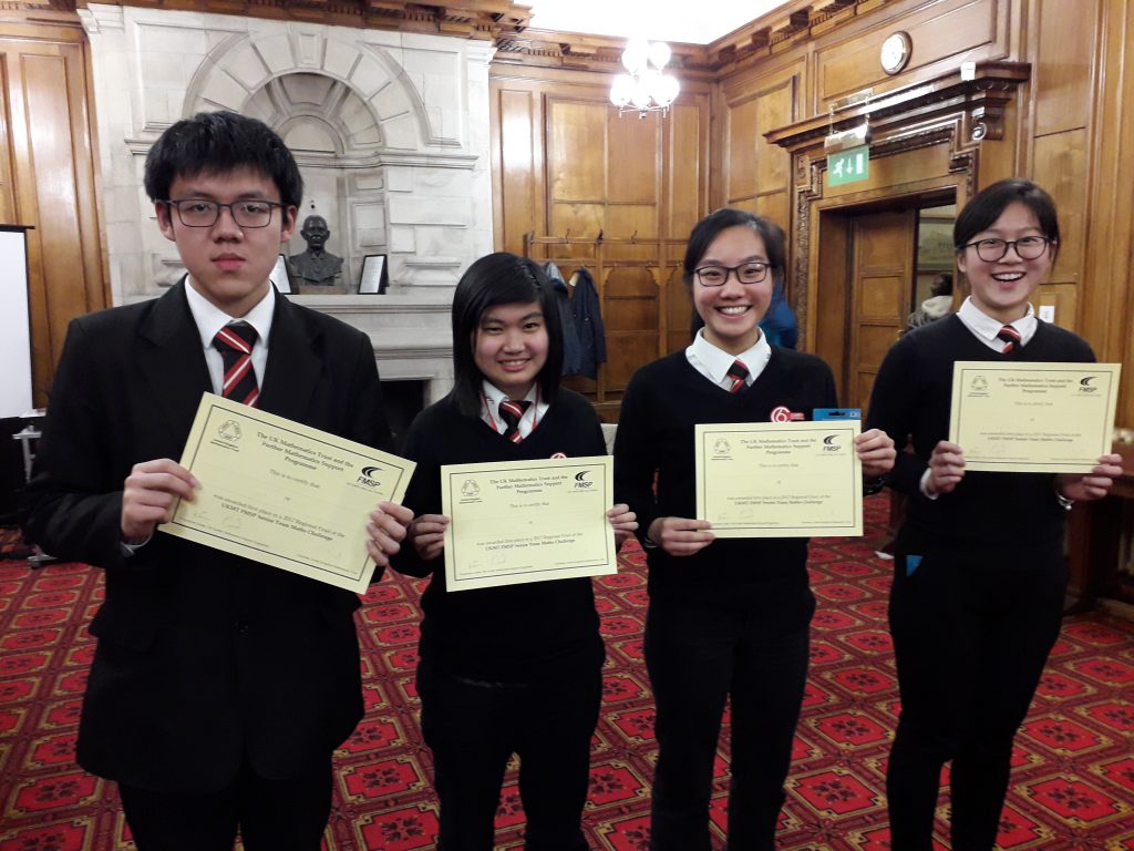 students holding certificates