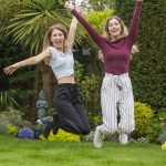 students from a private school in Cardiff cheering with their exam results