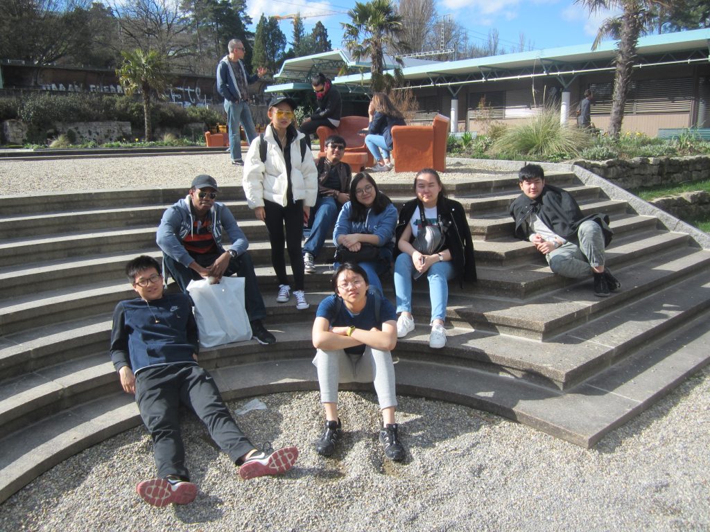 children sitting on steps