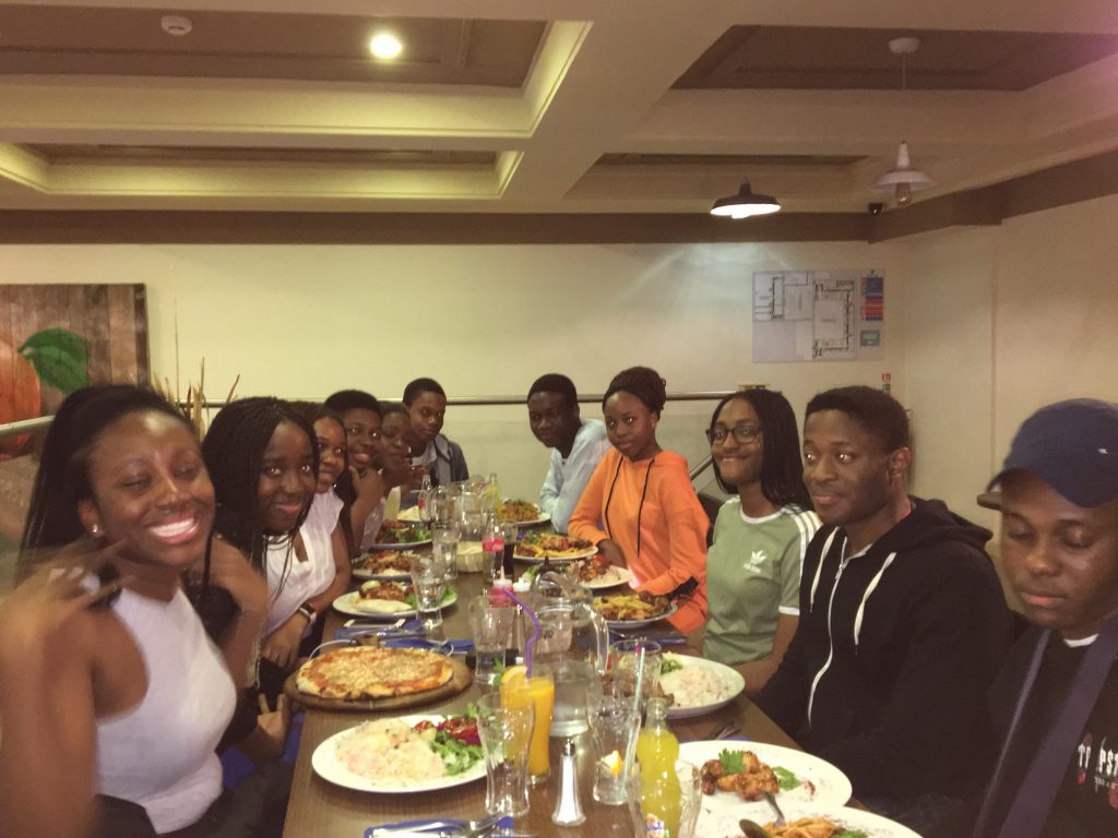 Students sat for dinner in a restaurant