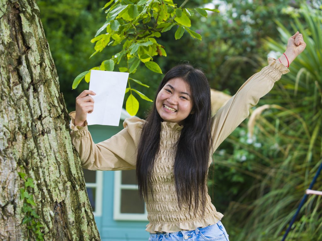 a student from a private school in Cardiff with her exam results